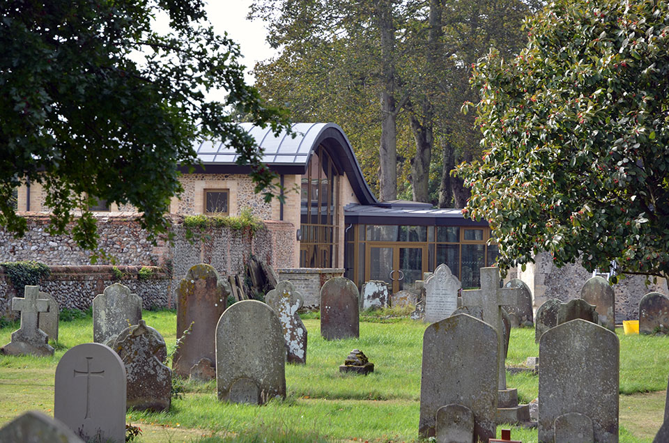 photo of gravestones and extension, Holt St Andrew church, Holt